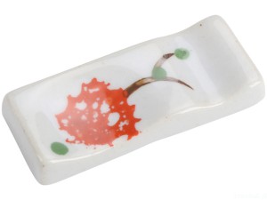 Ceramiczna podstawka pod pałeczki z pomarańczowym akcentem